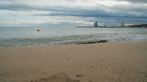 Waves of the Mediterranean Sea against the backdrop of the W Hotel Video stock 236294399