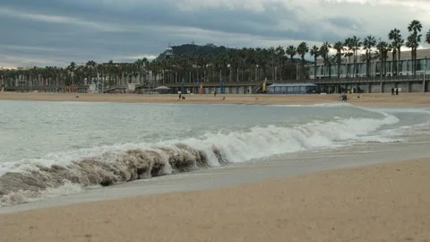 Waves of the Mediterranean Sea beating against the sandy shore 動画素材 236683130