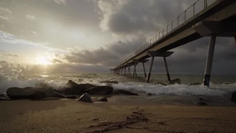 Waves of the mediterranean sea break on big stones. Stock Footage 139649406