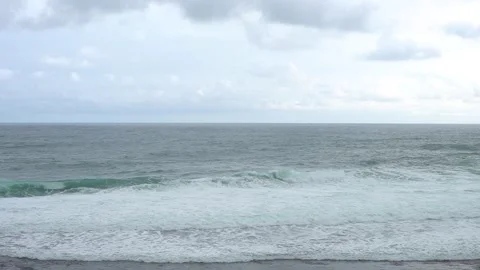 Waves in the middle of the beach Stock Footage 297142582