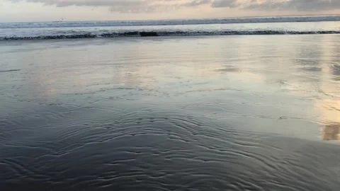 Waves in the morning on the beach Stock Footage 277956920