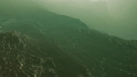 Waves move over rocky surface in water during cloudy day near coast Stock Footage 340227471