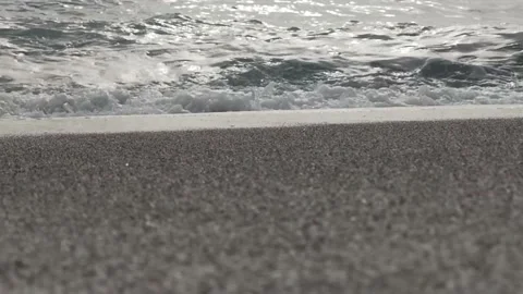  As the waves move, they create a texture of white sea foam.  Stock Footage 197143474