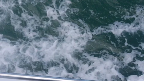 Waves moving next to boat Stock Footage 91228413