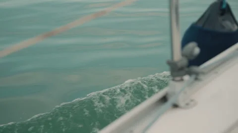 Waves from moving yacht closeup. deck of motorboat at the bow, close up. Sea Stock Footage 148007535