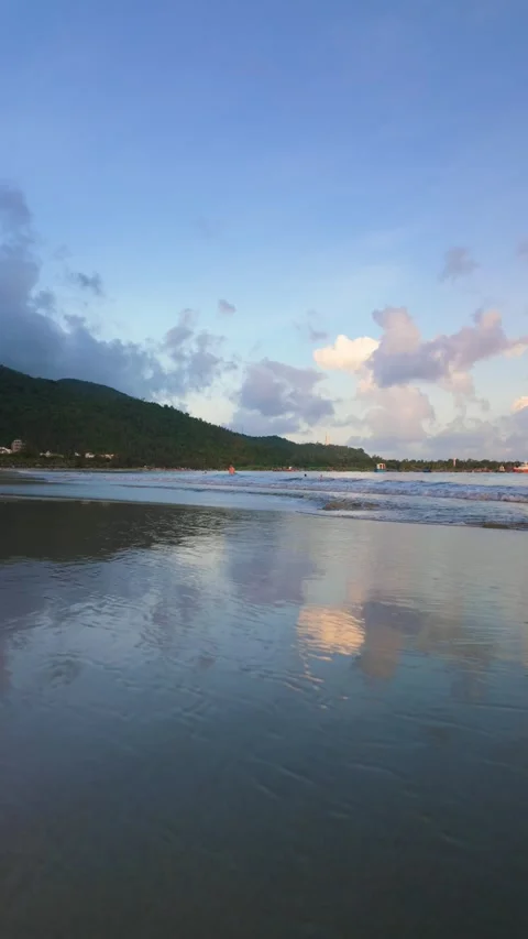 Waves at My Khe Beach with Son Tra Mountain, Da Nang Stock Footage 347935966