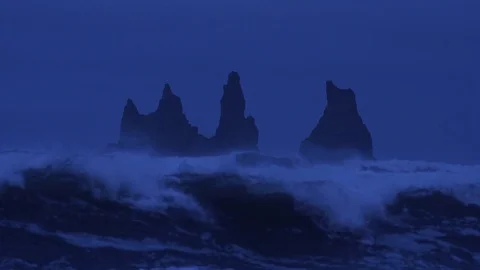 Waves at night with icelandic rock Stock Footage 78267986