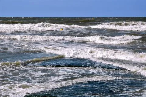 Waves on a Normandy beach Stock Photos