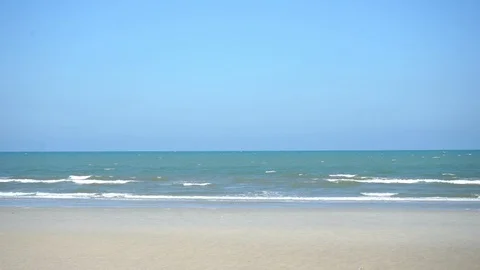 Waves in the ocean and sand beach Stock Footage 105418826