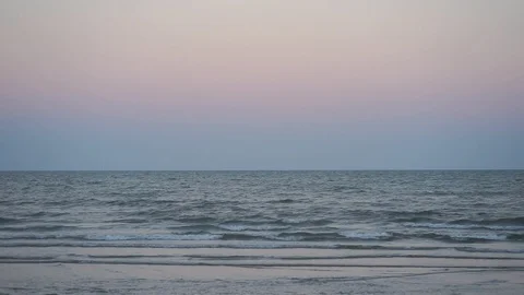 Waves in the ocean and sand beach Stock Footage 105419377