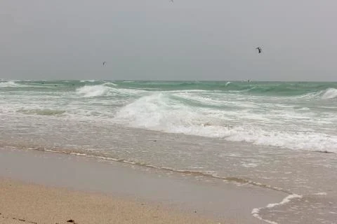 Waves of ocean on beach during daytime Stock Photos