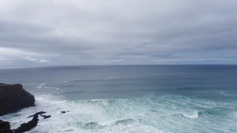 Waves of the ocean. Drone shot of cloudy weather Video stock 143496272