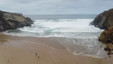 Waves of the ocean. Drone shot flying into the ocean Video stock 143496281