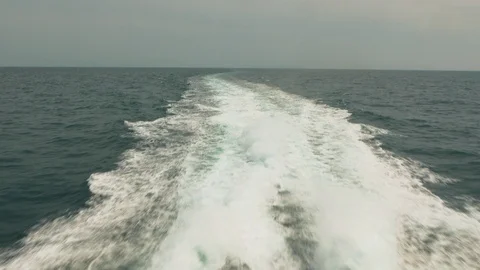 Waves on ocean seen from back of boat Stock Footage 92535761