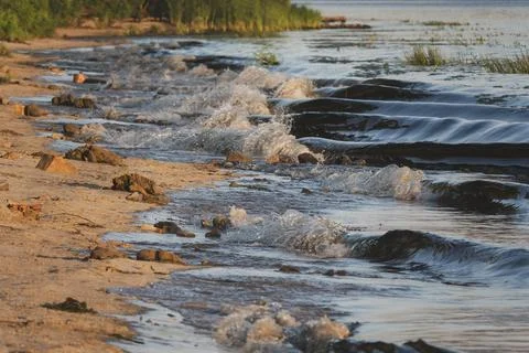 Waves of ocean surf on the beach. Photos