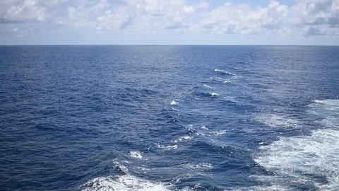 Waves in the open ocean from a cruise ship Stock Footage 104889257