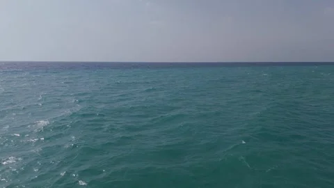 Waves in the open sea viewed from a drone. Slow-motion capture of turquoise.. Stock Footage 280394844