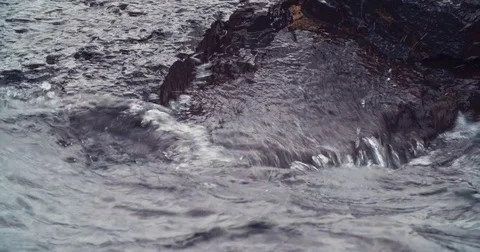 Waves Over Black Rock Static Close Up Stock Footage 71328627