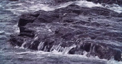 Waves Over Black Rock Static Stock Footage 71329249