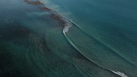 Waves over reef Stock Footage 113489940