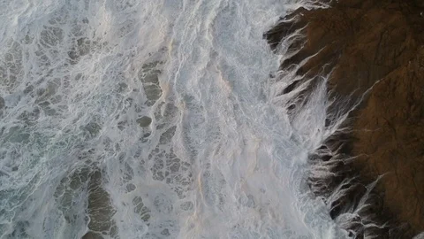 Waves over rocks Video stock 104242996
