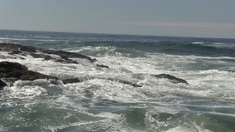 Waves Over Rocks in Ocean Stock Footage 119892740