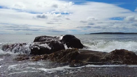 Waves Over Rocks Pan Stock Footage 160200835