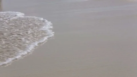 Waves over sandy beach Stock Footage 73253701