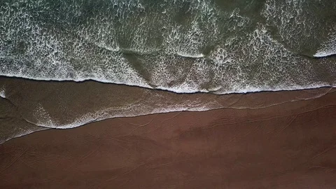 Waves over a sandy beach Stock Footage 87763151