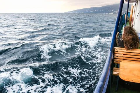 Waves overboard a moving vessel. Stock Photos