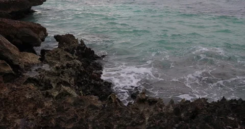 Waves On Overcast Beach Rocks Stock-Footage 145944498