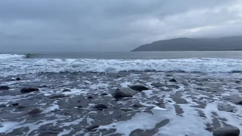 Waves on a pebble beach, Britain, UK Stock Footage 294225357