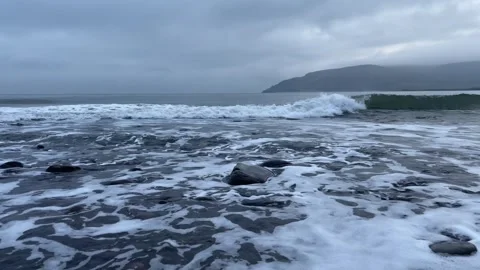 Waves on a pebble beach, Britain, UK Video stock 294225514
