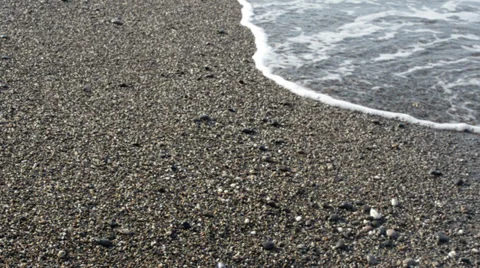 Waves on pebble beach Stock Footage 36756746