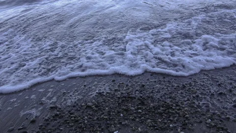 Waves on pebble shore Stock-Footage 147187394