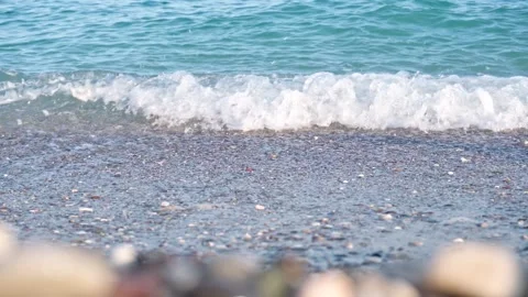 Waves on the pebble shore. Sea surf. Stock Footage 252042305