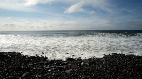 Waves on a Pebbly Beach Stock Footage 80272171