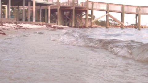 Waves with pier Stock Footage 219508159