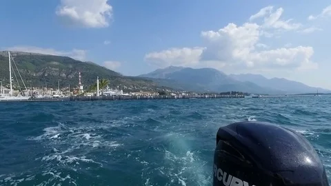 Waves pulled out from fast moving boat Stock Footage 75342944