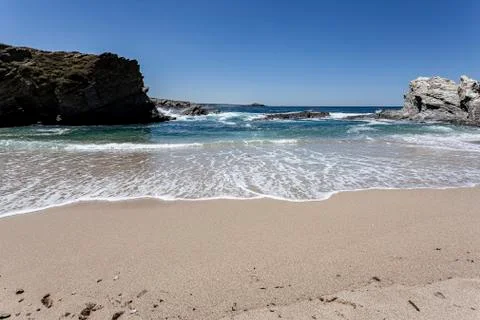 Waves on a quiet beach. Stock Photos