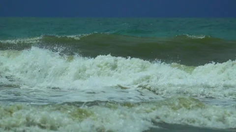 Waves in the raging sea in slow motion, in the background gloomy sky Stock Footage 226897166