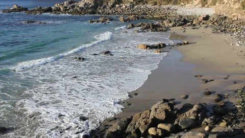 Waves reaching a beach in the Cantabrian coast Stock Footage 239913108