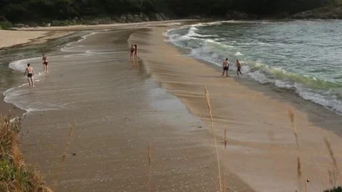Waves reaching a beach in the Cantabrian sea Stock Footage 258619190