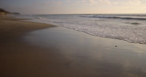Waves reaching the beach in slow motion Stock Footage 96374856