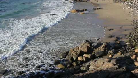 Waves reaching a Cantabrian beach Stock Footage 239913099