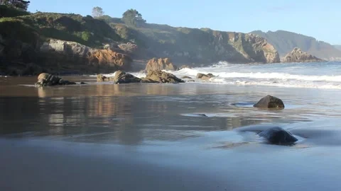 Waves reaching Cantabrian Coast in Spain during sunrise Stock Footage 288674854