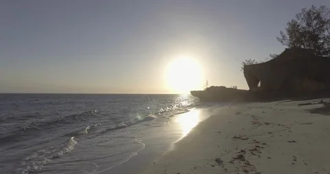 Waves reaching the coast at dusk Stock Footage 85772117