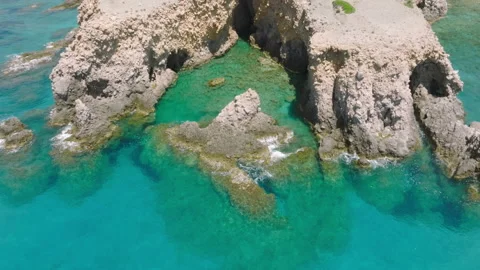 Waves reaching the rocky coast of Milos Island, Greece Stock Footage 220182519