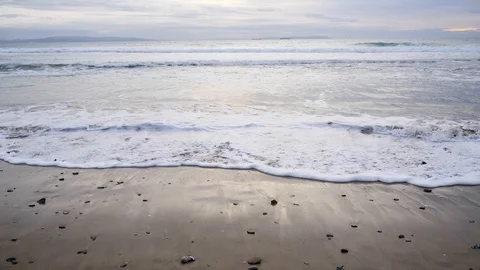 Waves reaching Spanish shore on the beach near Tarifa in winter Stock Footage 100542909