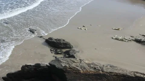 Waves reaching a tiny beach in the Cantabrian coast in Foz, Galicia Stock Footage 234593670